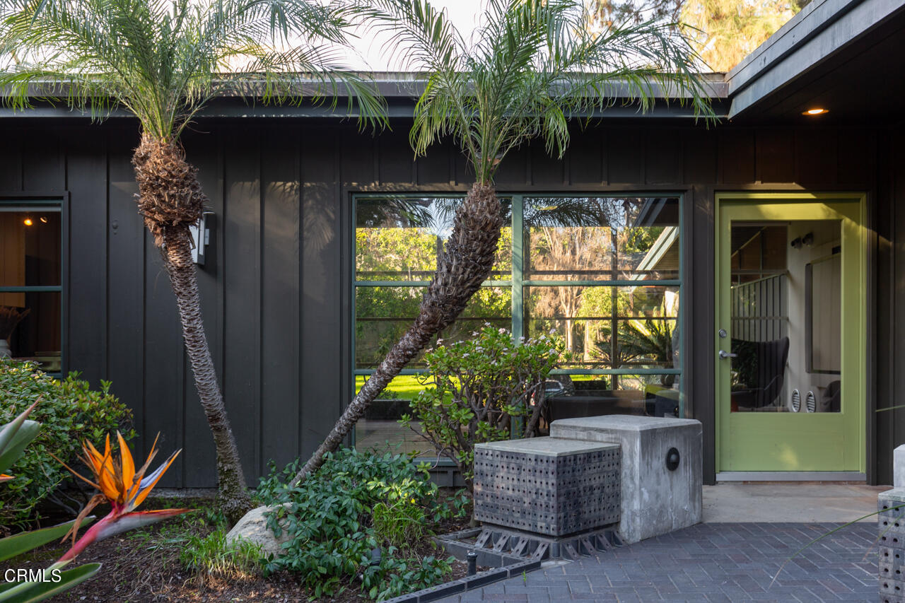 1439 Lida Street Pasadena, CA 91103 - Photo 2 of 39 a front view of a house with a garden