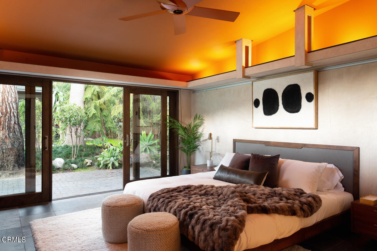 1439 Lida Street Pasadena, CA 91103 - Photo 23 of 39 a bedroom with furniture and a large window