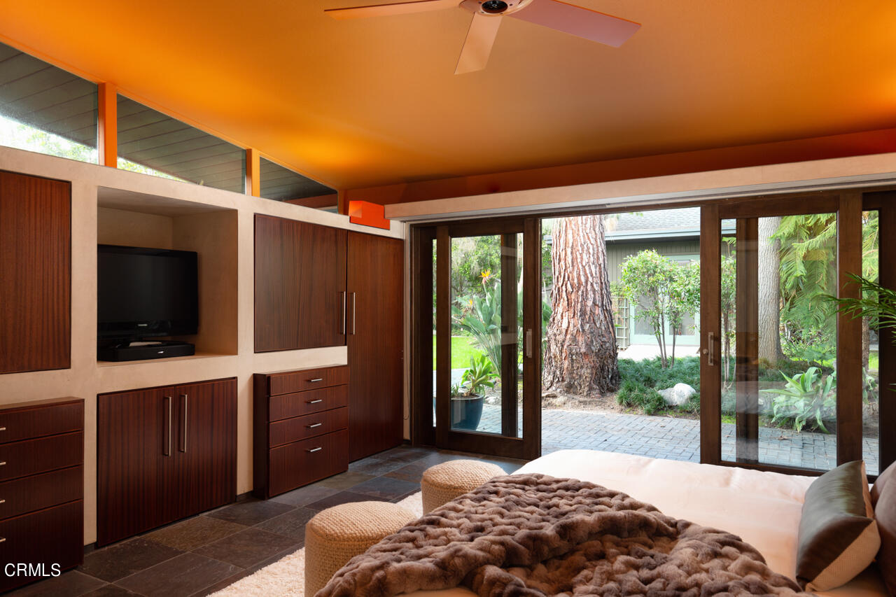 1439 Lida Street Pasadena, CA 91103 - Photo 24 of 39 a bedroom with a bed and a flat screen tv