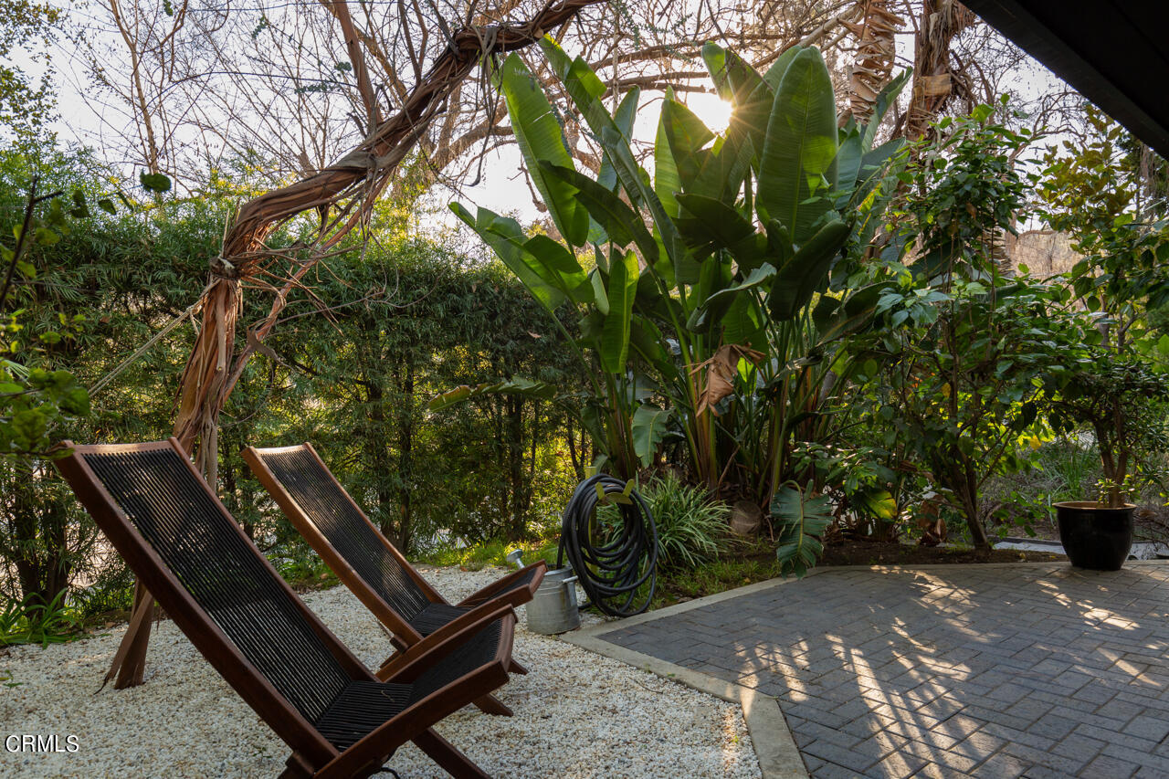 1439 Lida Street Pasadena, CA 91103 - Photo 27 of 39 a view of a bench in a backyard