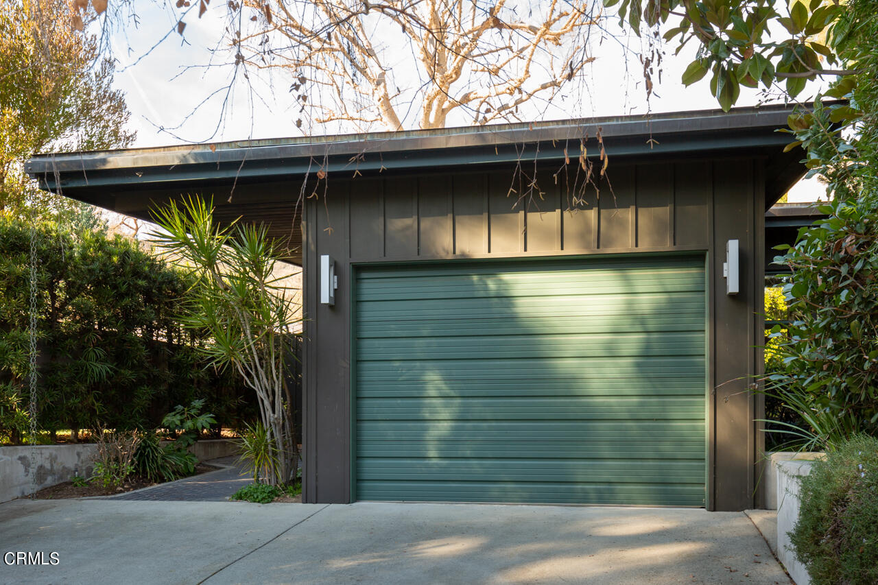 1439 Lida Street Pasadena, CA 91103 - Photo 39 of 39 a small backyard of a house with plants and trees
