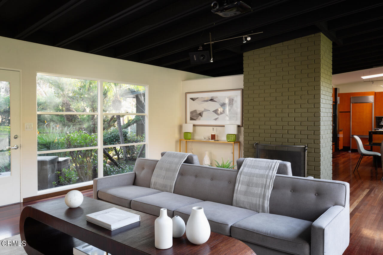 1439 Lida Street Pasadena, CA 91103 - Photo 5 of 39 a work room with furniture and a floor to ceiling window