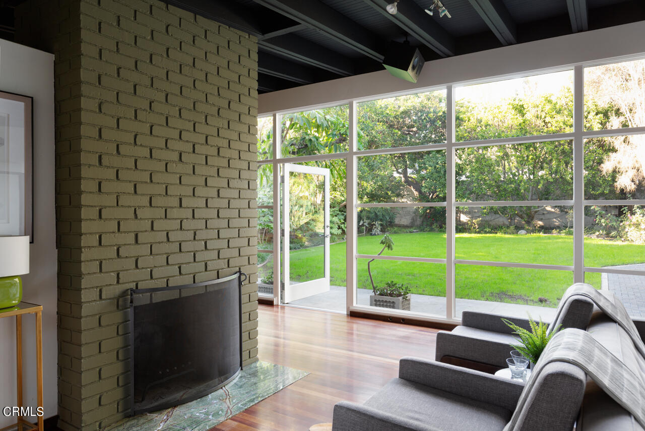1439 Lida Street Pasadena, CA 91103 - Photo 6 of 39 a living room with furniture and a floor to ceiling window