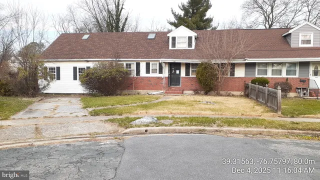 a view of house with yard and outdoor space