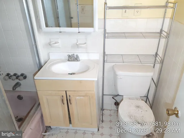 a view of hallway with washer and dryer