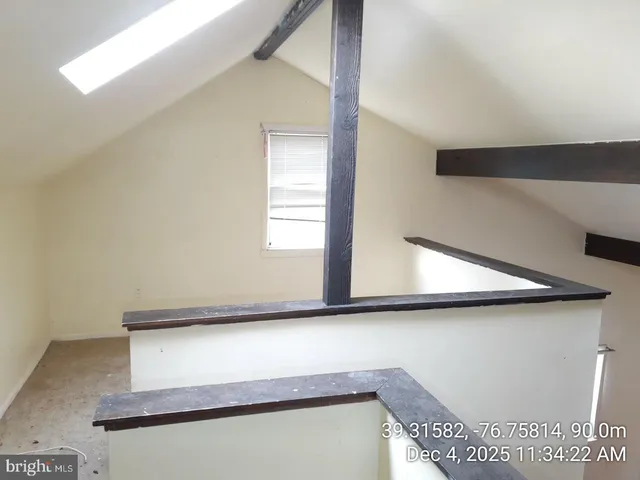 a close view of a shower and a sink