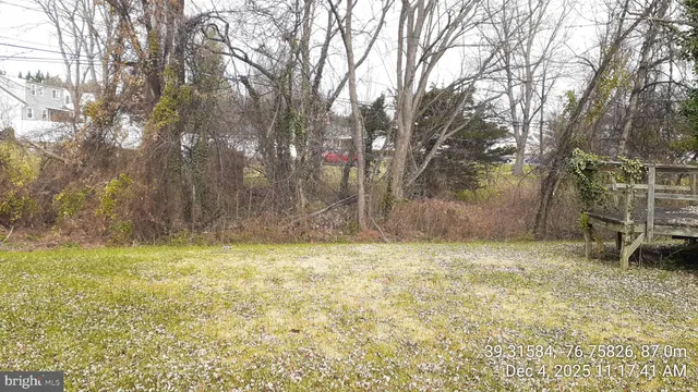 a view of a chairs and table in the patio