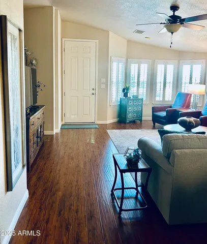 a view of a dining room with furniture window and outside view
