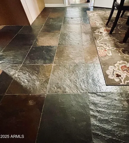 a view of backyard with sitting area