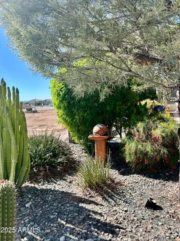 a view of a swimming pool with chairs
