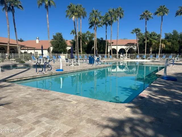 a view of outdoor space with signage and flags