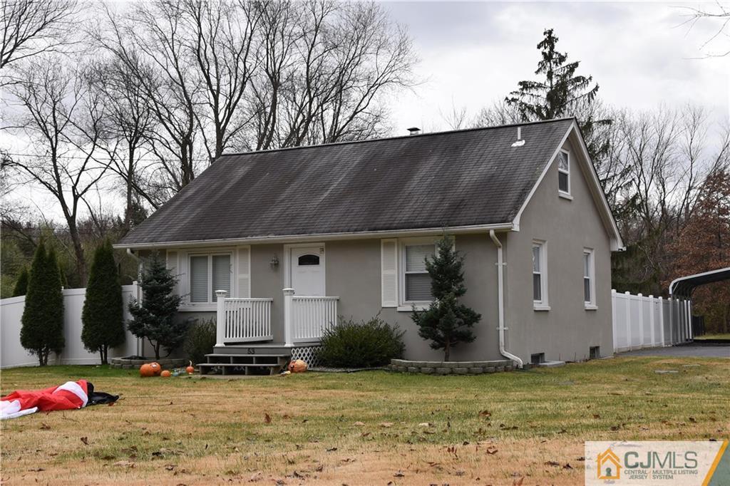 53 Old Mill Road Old Bridge, NJ 07747 - Photo 1 of 1 a house that has a tree in front of it