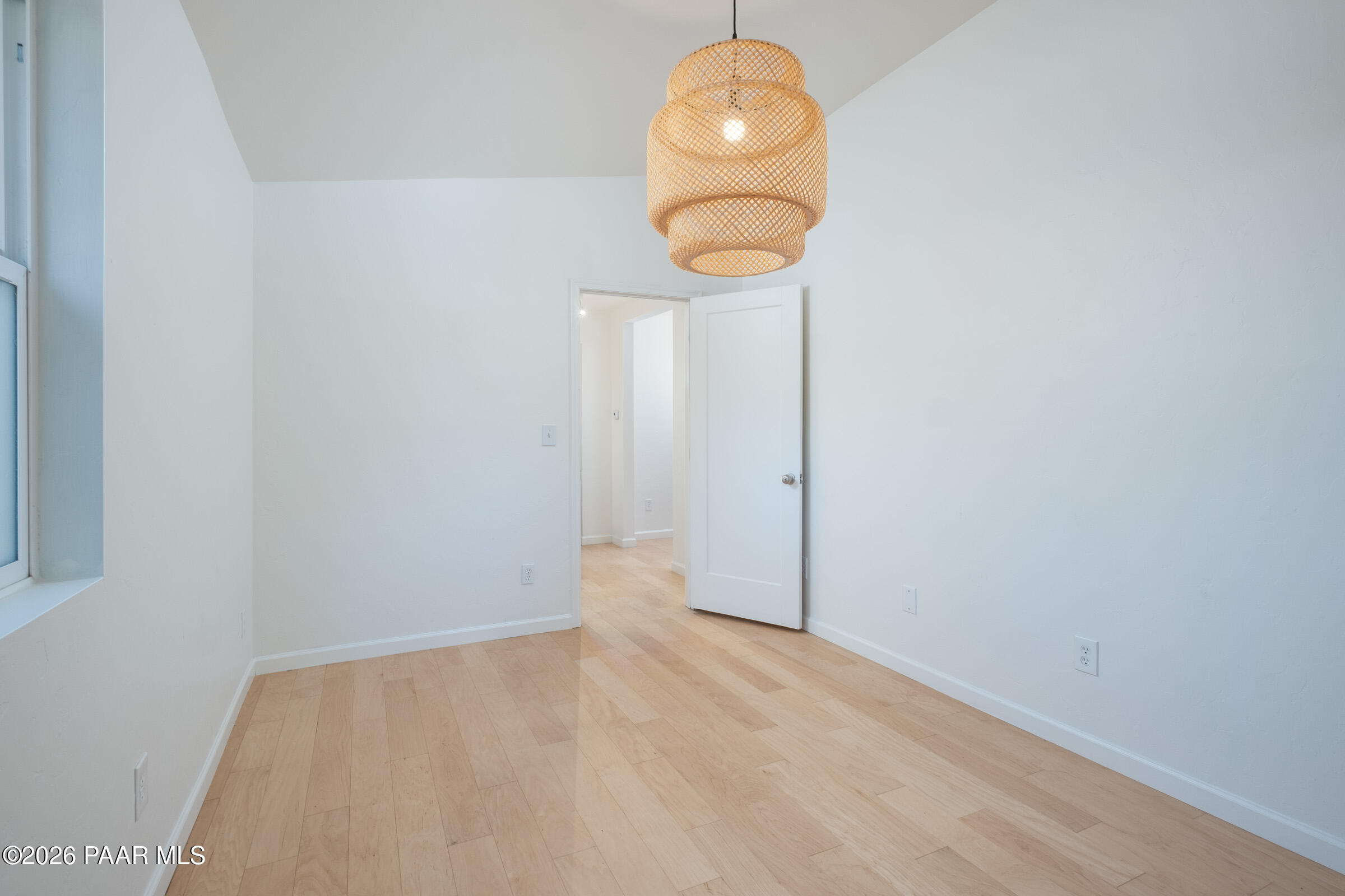 815 Ruth Street Prescott, AZ 86301 - Photo 8 of 30 a view of a room with wooden floor and glass door