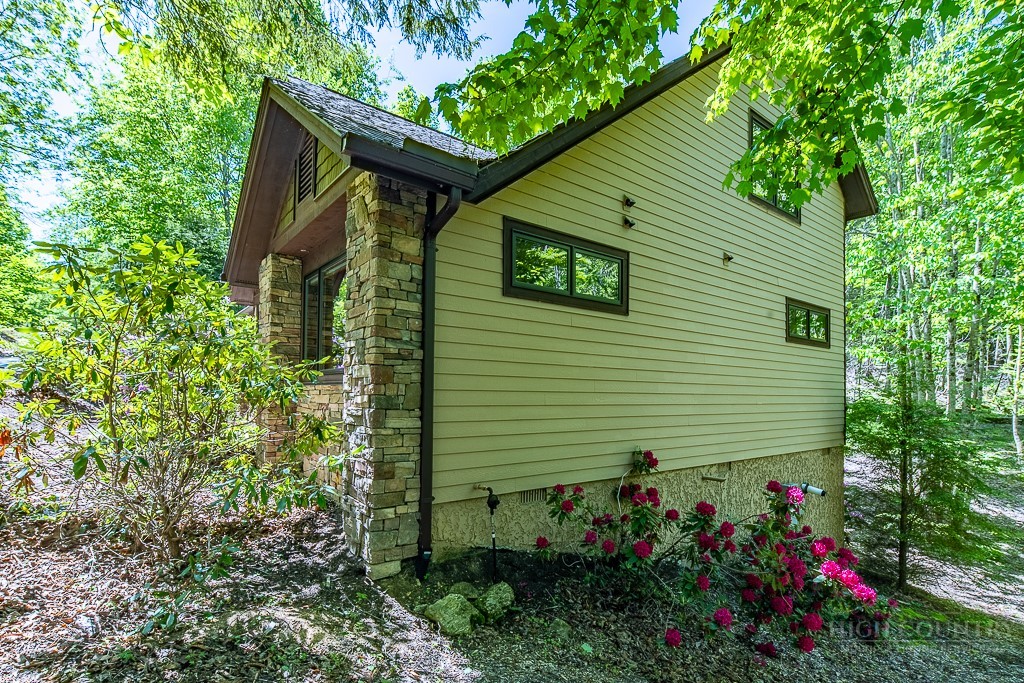 485 Woodlake Loop Road Elk Park, NC 28622 - Photo 28 of 44 a view of a house with a yard