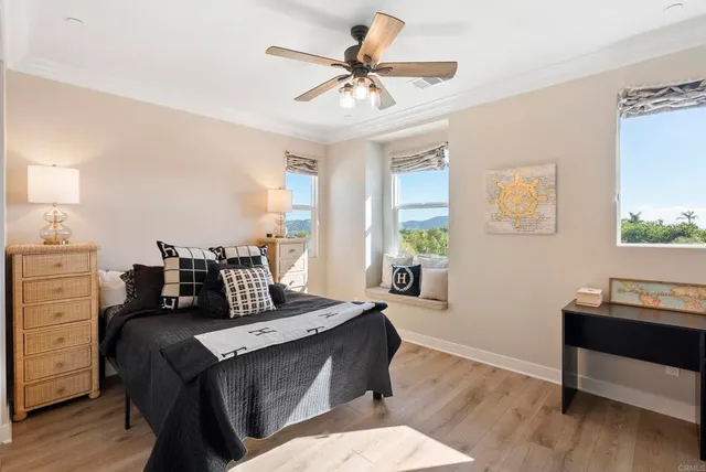 a bed room with a bed and a window