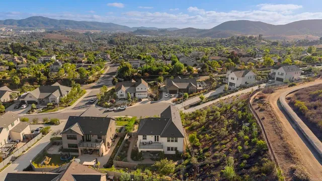 an aerial view of residential house with an outdoor space