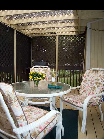1667 South Kihei Road, Unit C Kihei, HI 96753 - Photo 4 of 5 a outdoor dining area with furniture and window