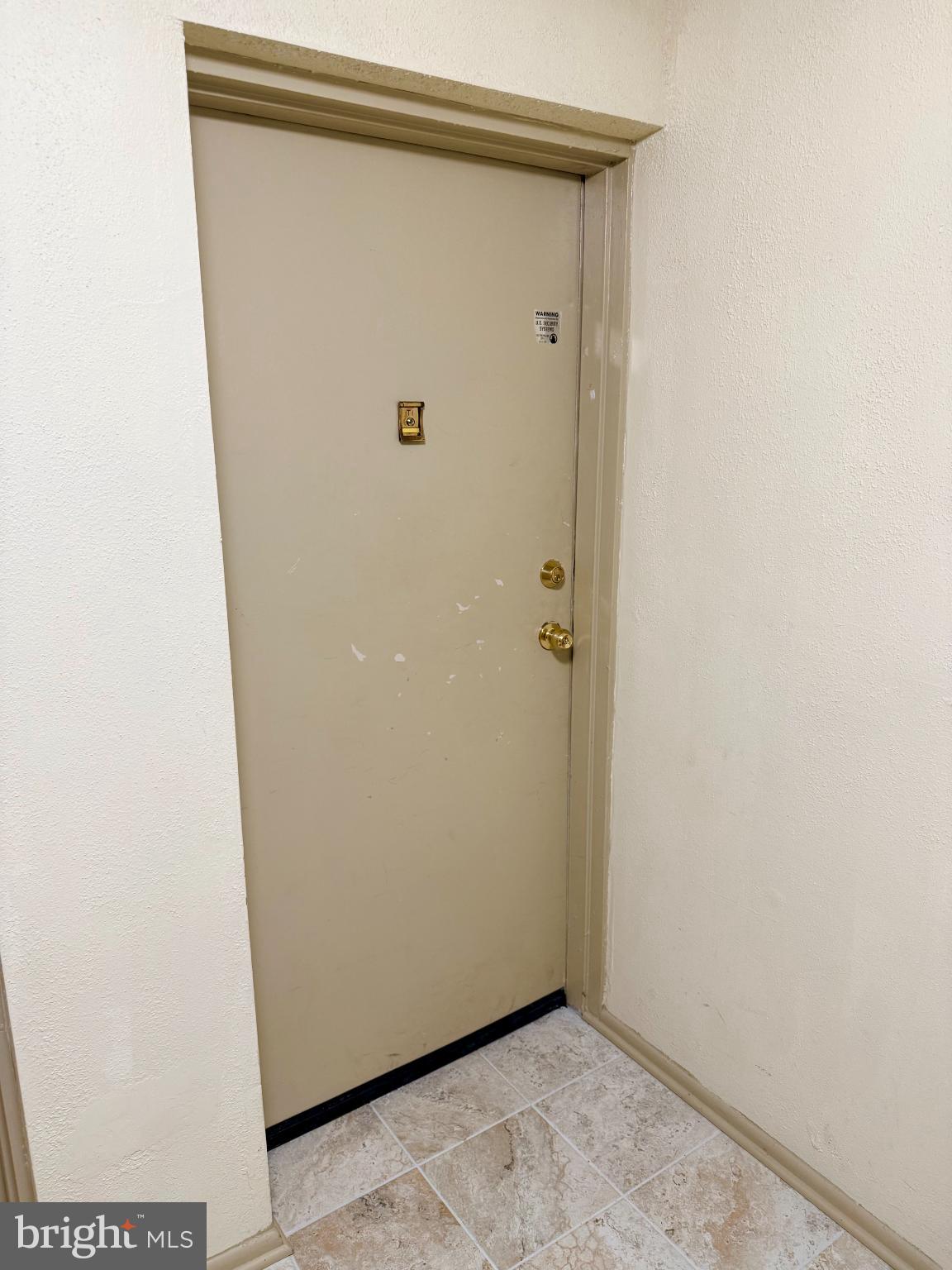 5 Suntop Court, Unit T1 Baltimore, MD 21209 - Photo 2 of 14 Inviting entrance to a cozy abode.