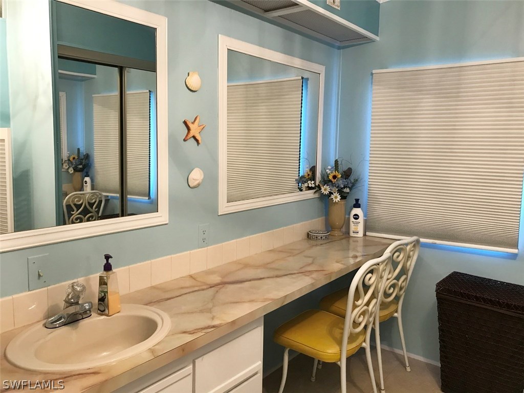 10441 Circle Pine Road North Fort Myers, FL 33903 - Photo 14 of 20 a dining room with furniture and window