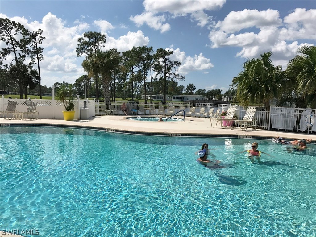 10441 Circle Pine Road North Fort Myers, FL 33903 - Photo 19 of 20 a view of a lake with houses