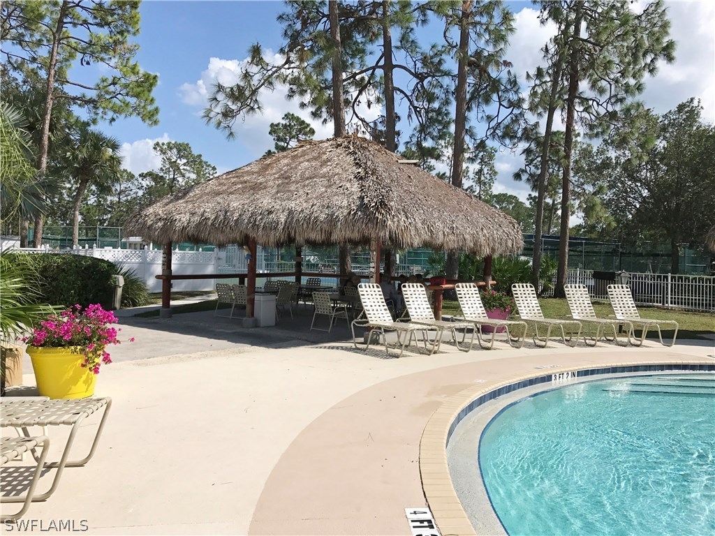 10441 Circle Pine Road North Fort Myers, FL 33903 - Photo 20 of 20 a view of a backyard with sitting area