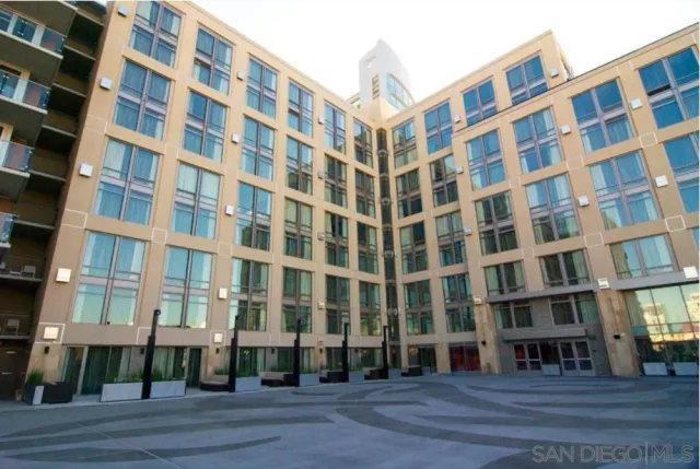 a front view of a building with street view