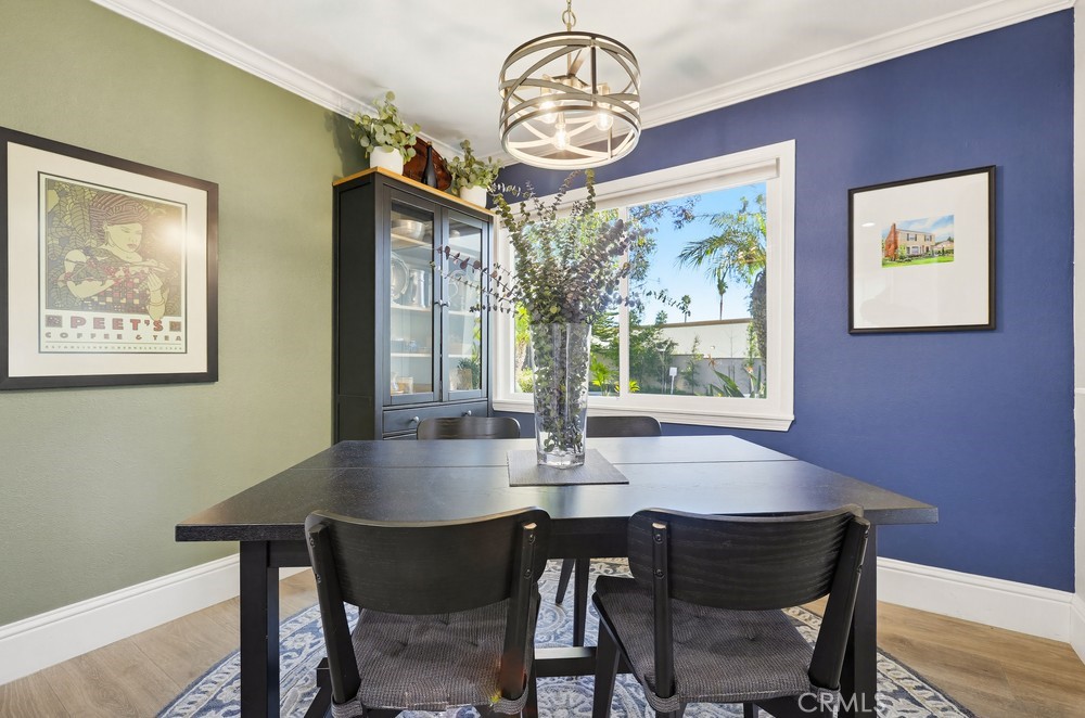 47 Vía Lavendera Rancho Santa Margarita, CA 92688 - Photo 12 of 40 a view of a dining room with furniture window and wooden floor