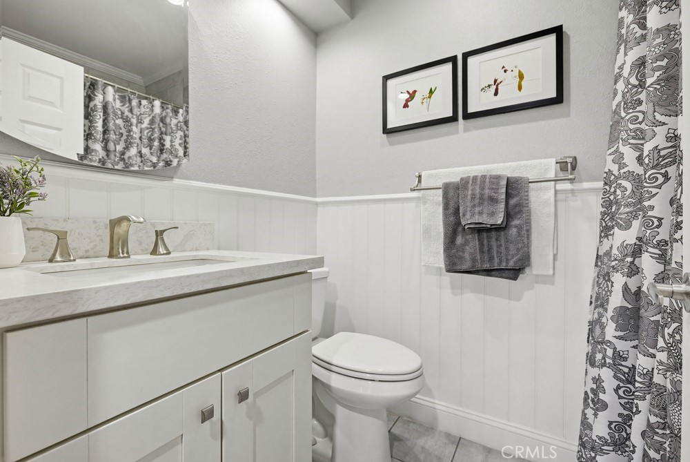 47 Vía Lavendera Rancho Santa Margarita, CA 92688 - Photo 22 of 40 a bathroom with a toilet sink and mirror