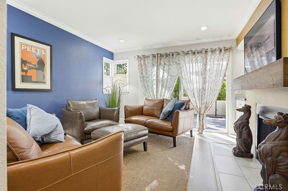 47 Vía Lavendera Rancho Santa Margarita, CA 92688 - Photo 7 of 40 a living room with furniture and a large window