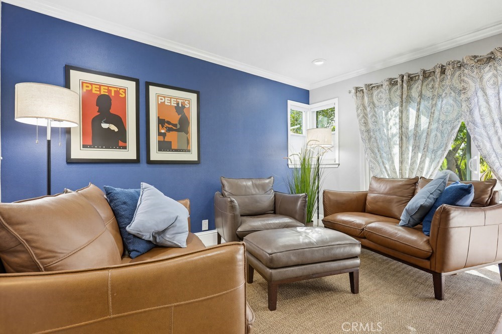 47 Vía Lavendera Rancho Santa Margarita, CA 92688 - Photo 8 of 40 a living room with furniture and a window