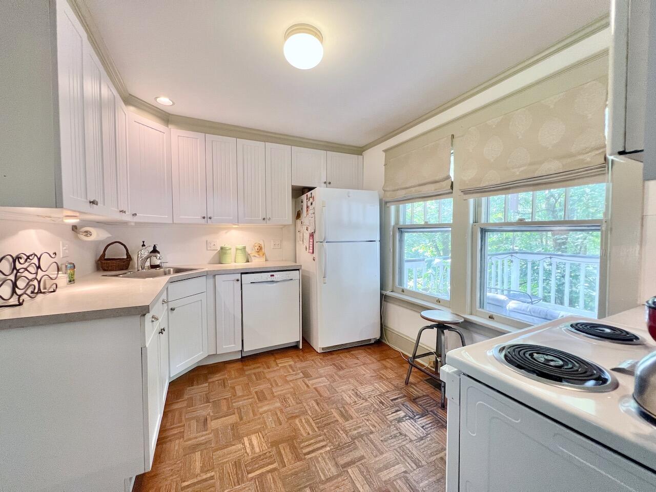 319 Rowayton Avenue Rowayton, CT 06853 - Photo 11 of 25 a kitchen with a stove a sink and a refrigerator