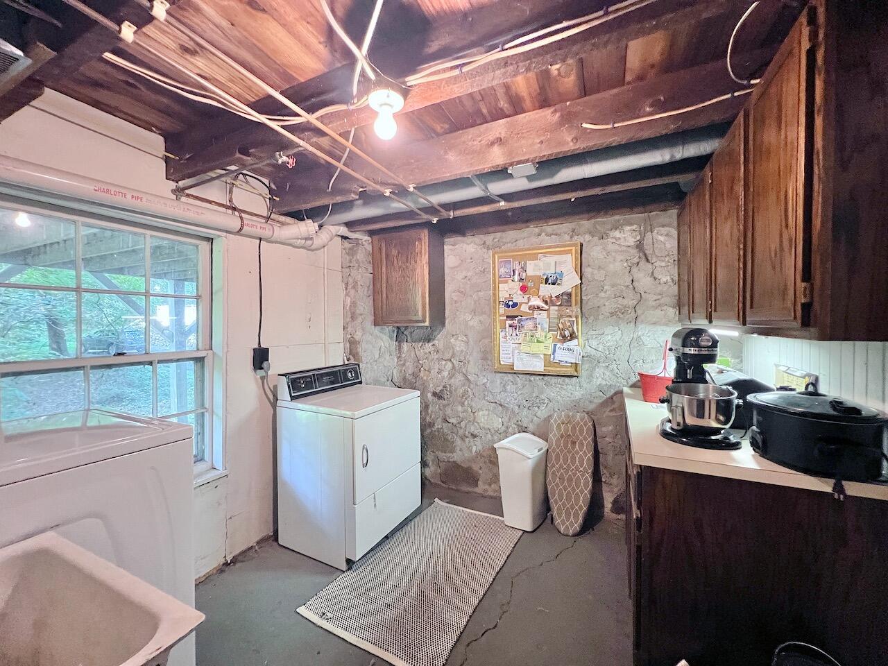 319 Rowayton Avenue Rowayton, CT 06853 - Photo 21 of 25 a kitchen with a stove and a white refrigerator