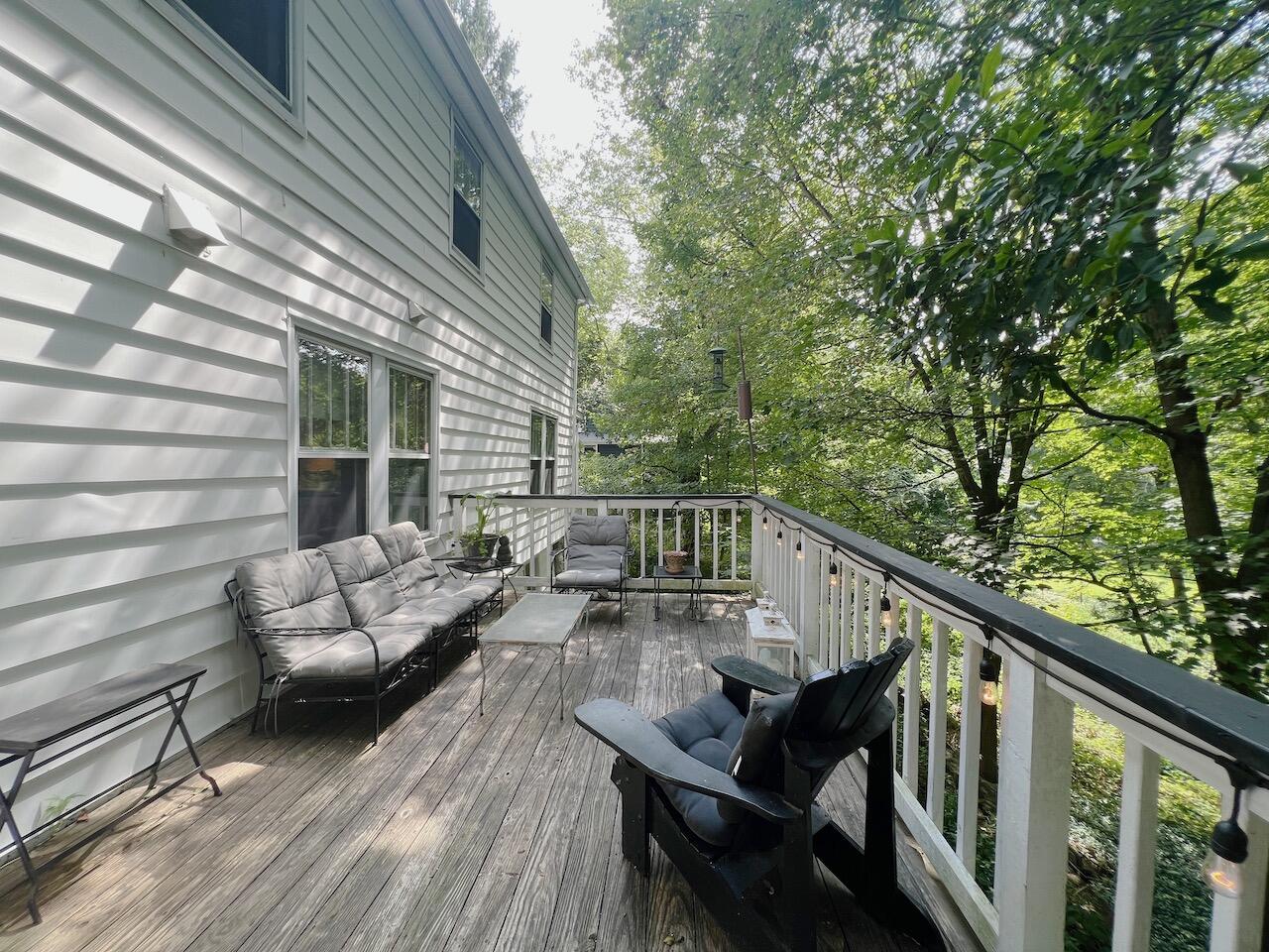 319 Rowayton Avenue Rowayton, CT 06853 - Photo 22 of 25 a balcony with wooden floor and outdoor seating