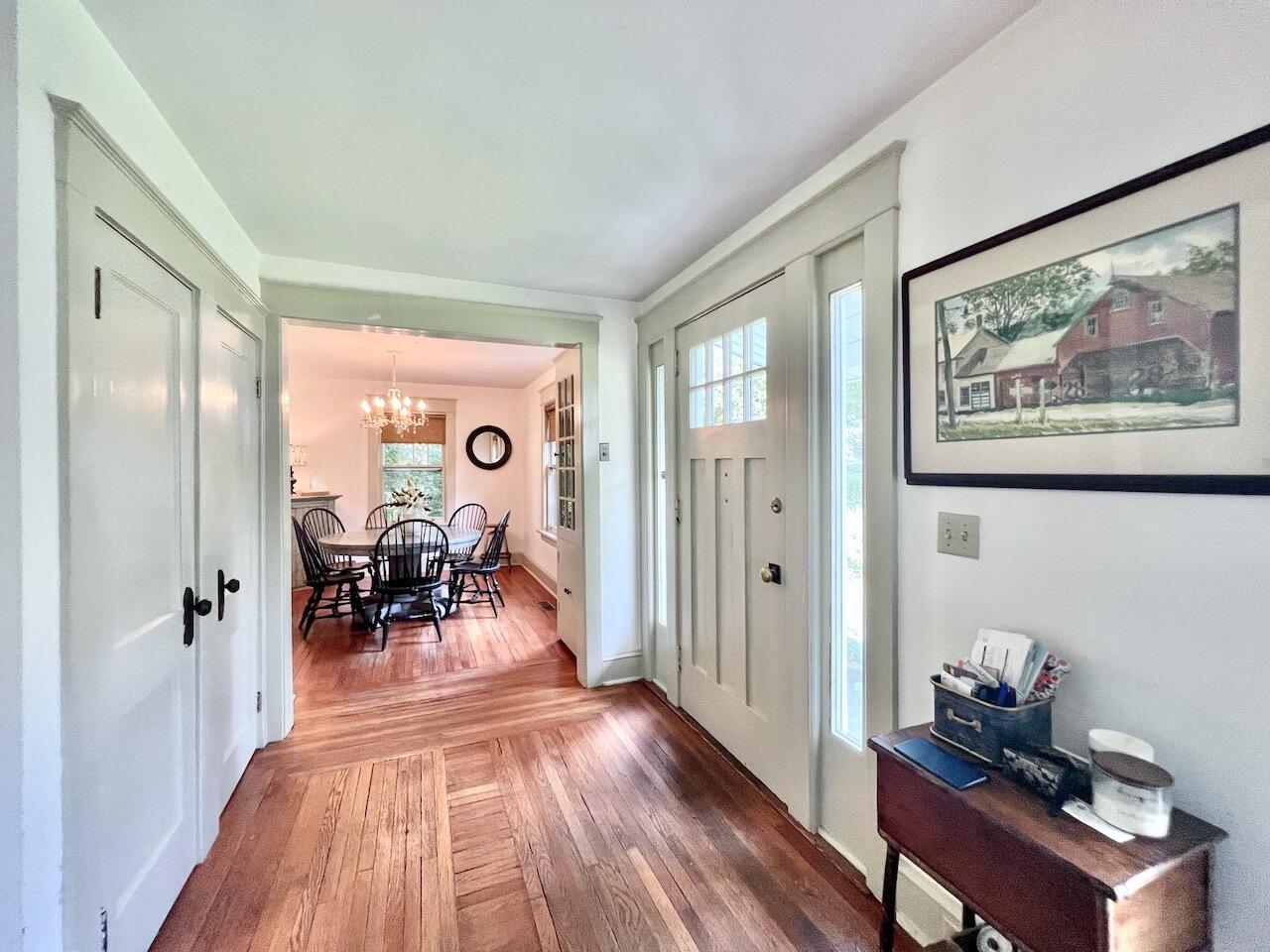 319 Rowayton Avenue Rowayton, CT 06853 - Photo 3 of 25 a view of a room with wooden floor and furniture
