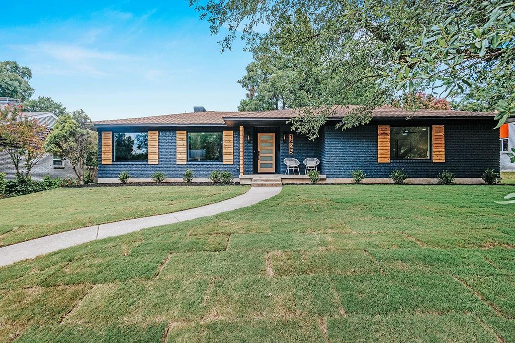 1425 Mapleton Drive Dallas, TX 75228 - Photo 1 of 1 View of front of house featuring a front yard and a porch