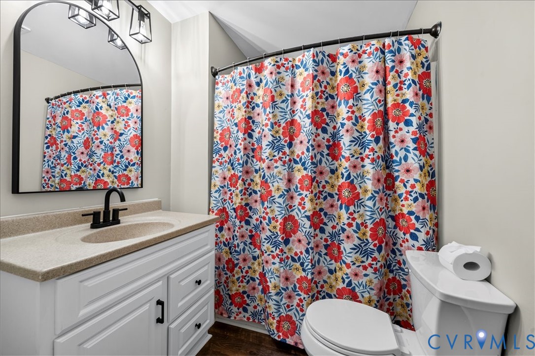 6208 Barrister Road Chesterfield, VA 23832 - Photo 17 of 37 Bathroom featuring a white vanity with a light-col