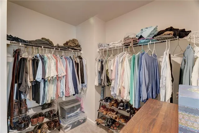 a view of a livingroom with furniture and a flat screen tv