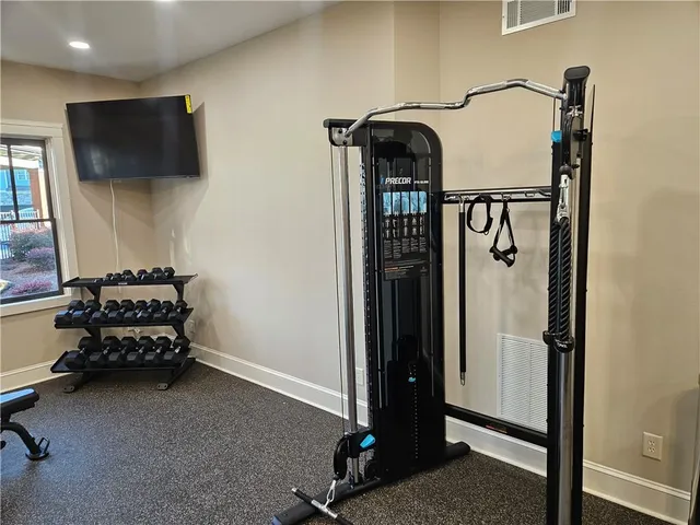 a view of a dining room with furniture