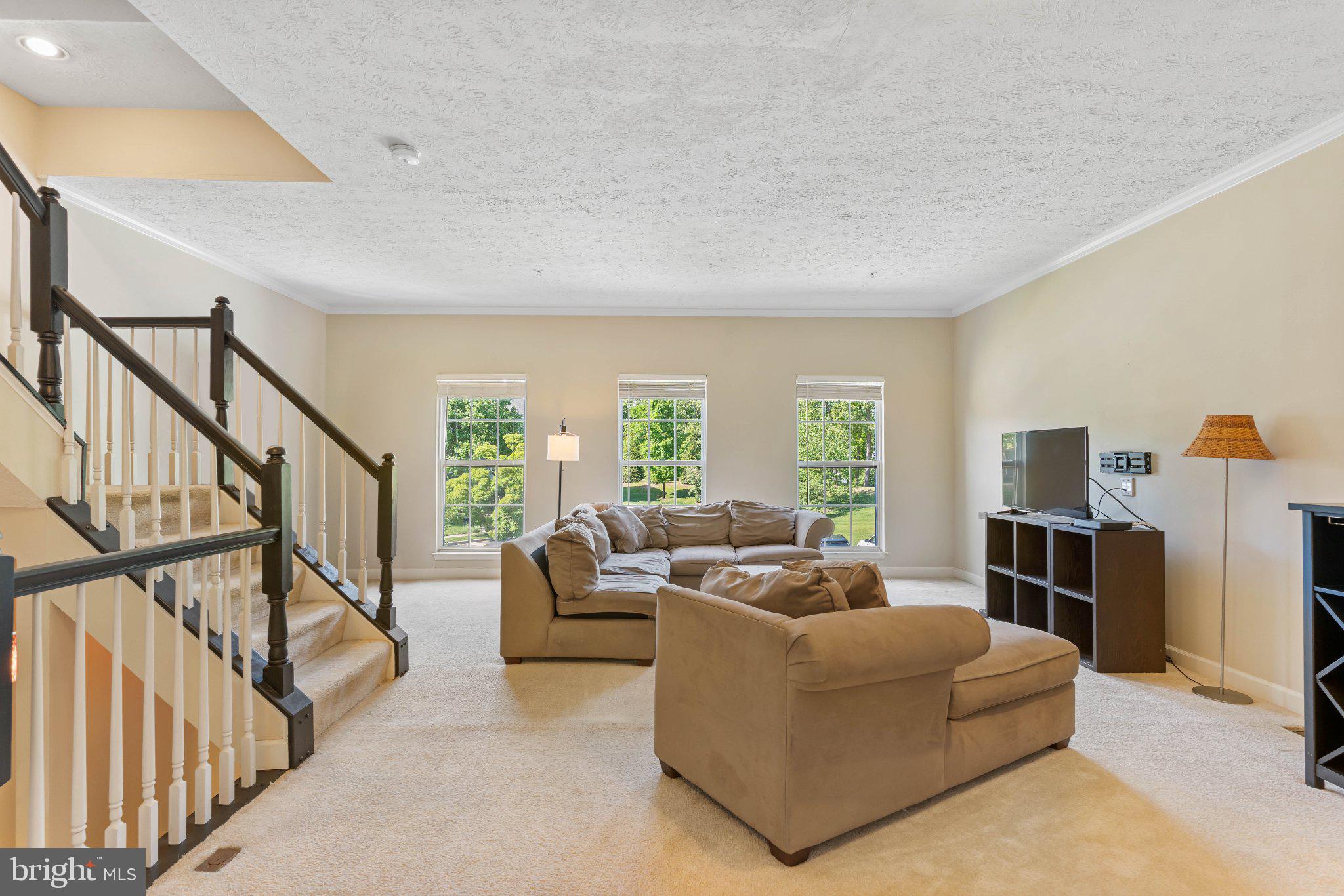 1369 Escapade Court Riva, MD 21140 - Photo 6 of 46 Main level Family Room with great natural light