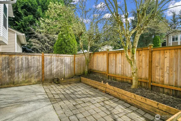 a view of a backyard of the house