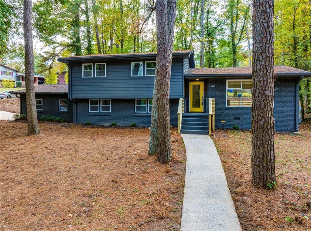 3400 Mt Gilead Road Southwest Atlanta, GA 30331 - Photo 1 of 1 a front view of a house with a porch