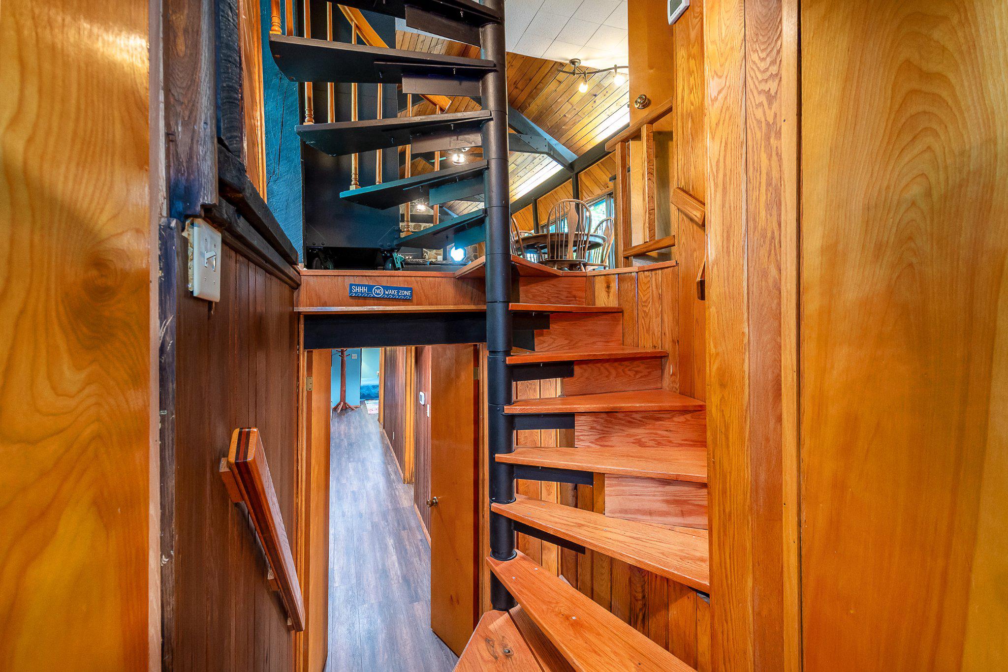 750 Lake Side Road Addison, PA 15411 - Photo 37 of 51 Spiral staircase joins the three levels.