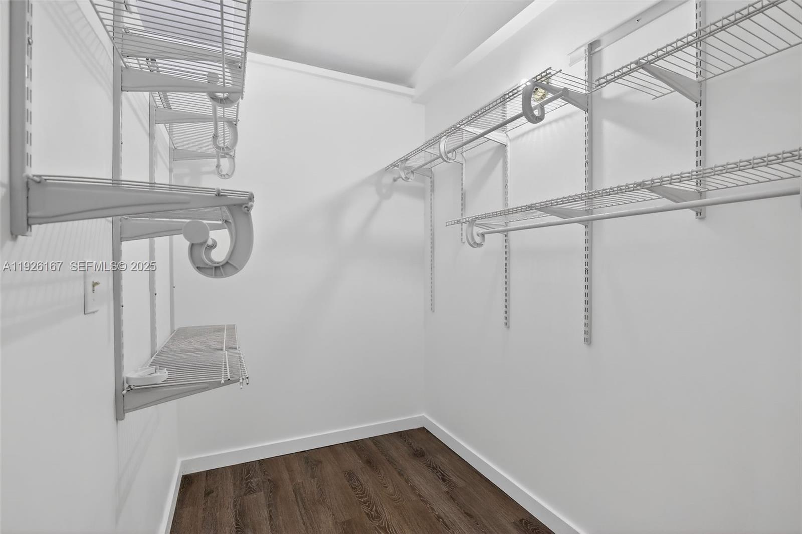 9703 North New River Canal Road, Unit 103 Plantation, FL 33324 - Photo 22 of 32 a view of a room with rack on the wall and a window