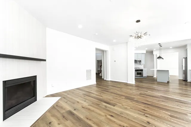 a view of staircase with white walls