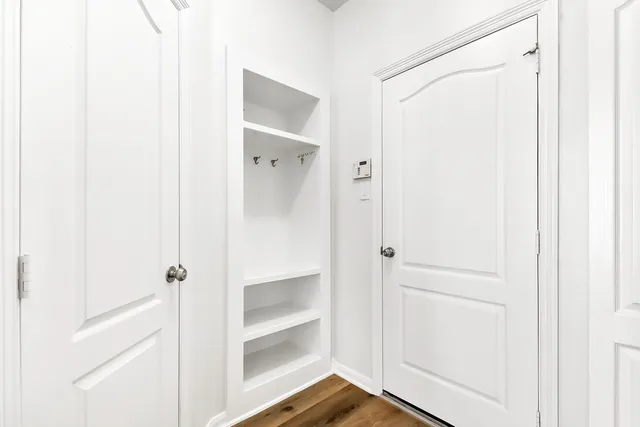 an empty room with windows