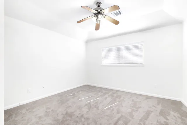 a view of entryway and kitchen