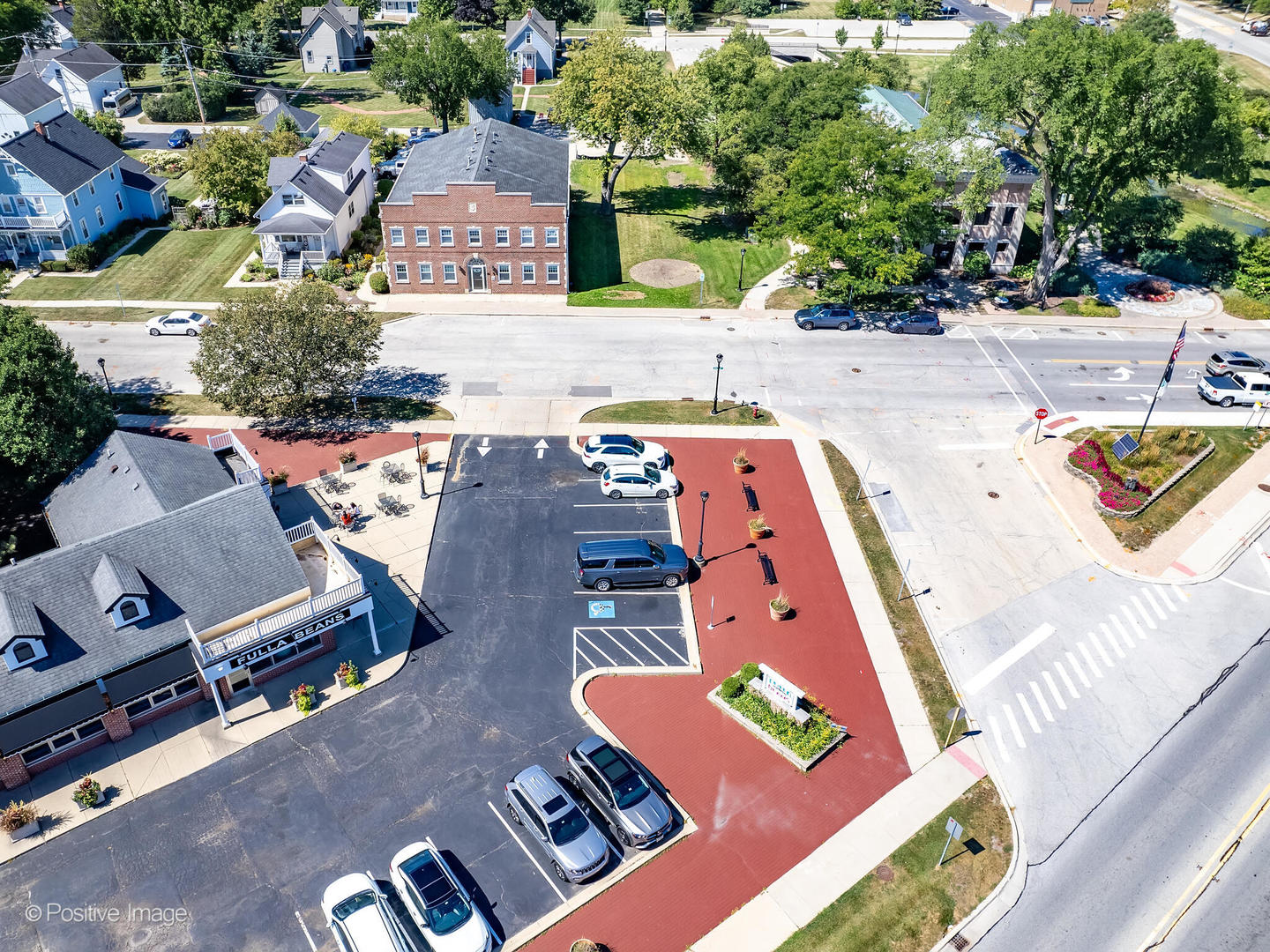 100 South Walnut Street Itasca, IL 60143 - Photo 2 of 8 an aerial view of a house with a garden