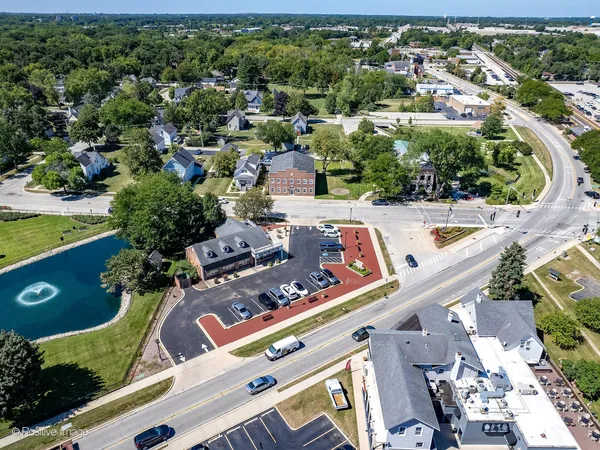 an aerial view of swimming pool patio and mountain view
