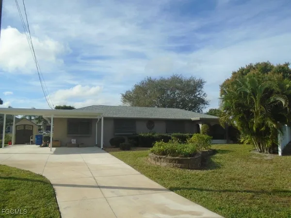 a front view of house with yard