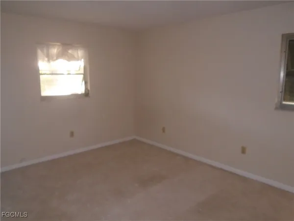 an empty room with a window